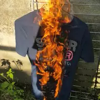 Superdry tee consumed by flames